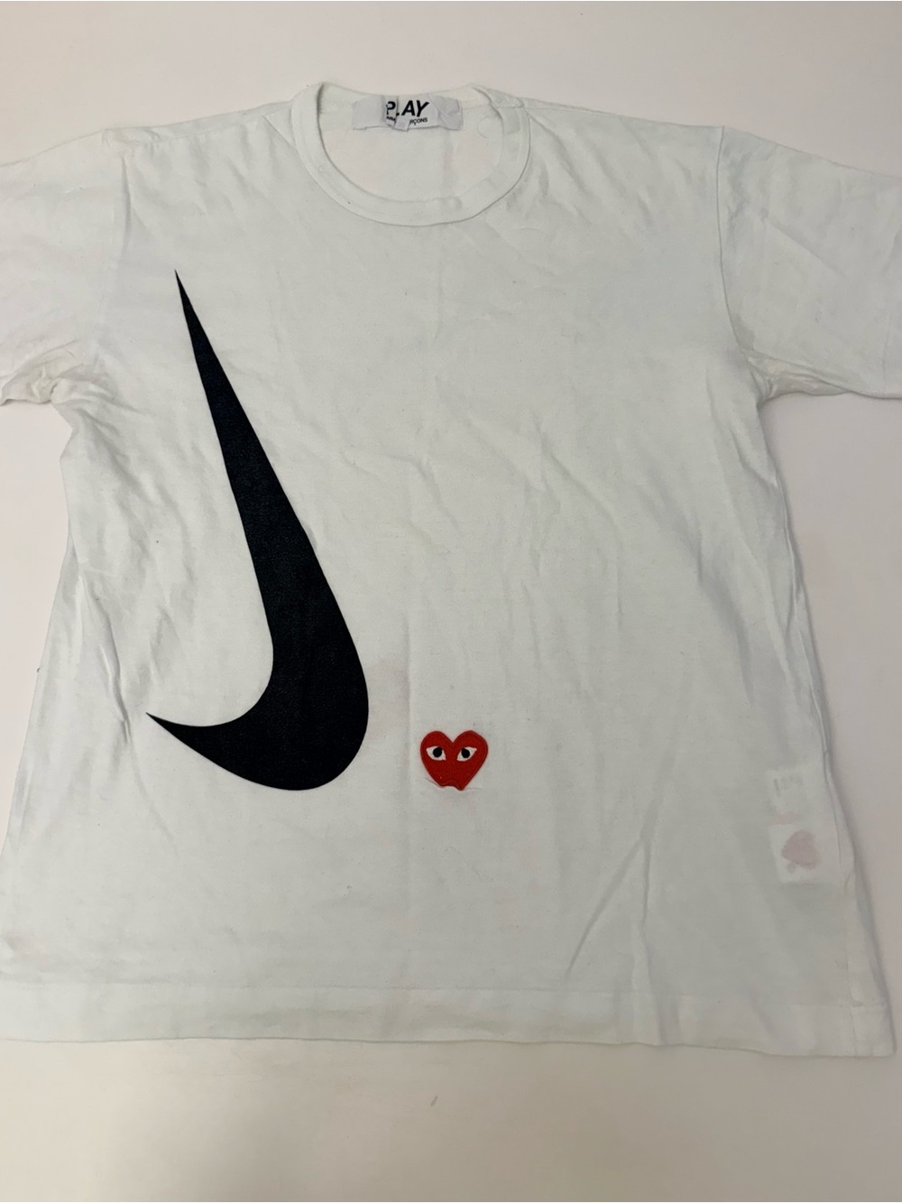 Comme des Garcons White Tee with Black Swoosh and Red Heart